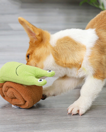 Happy dog playing with a toy.