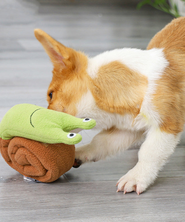 Happy dog playing with a toy.