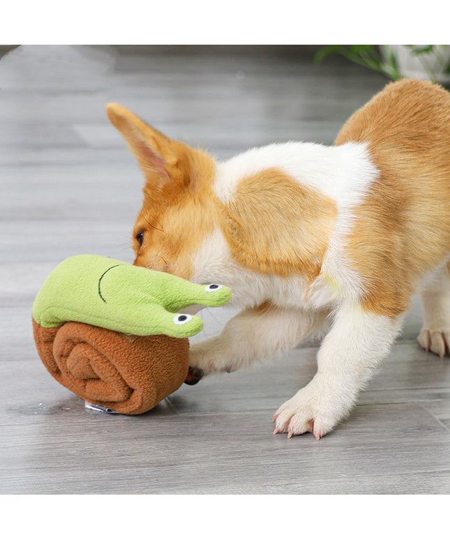 Happy dog playing with a toy.