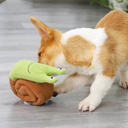 Happy dog playing with a toy.